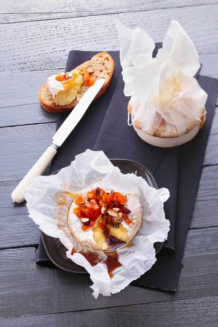 Baked Camembert with dried fruits and nuts