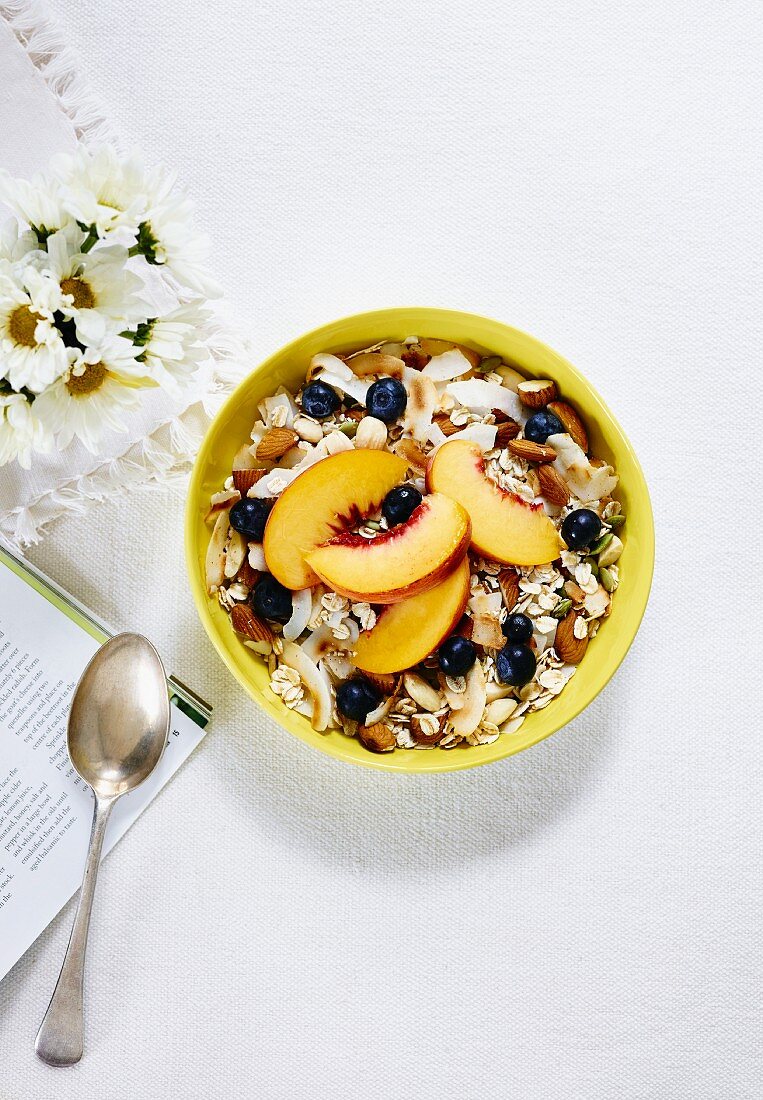 Muesli with blueberries and peaches