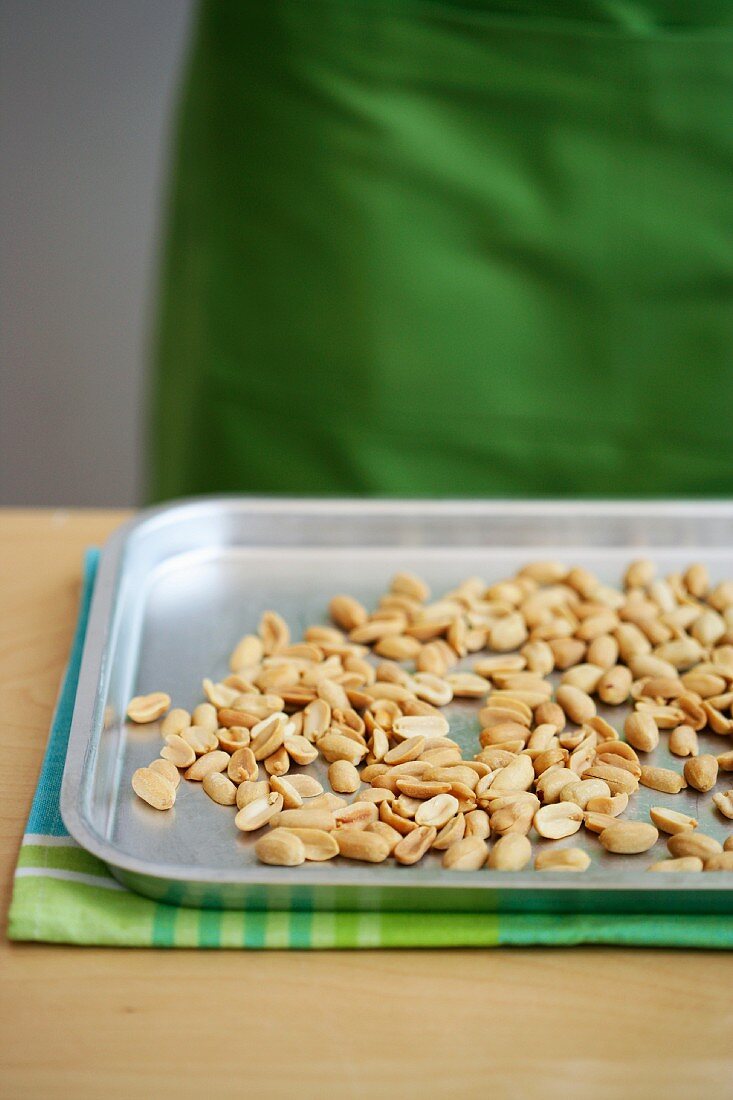 Peanuts on a baking tray