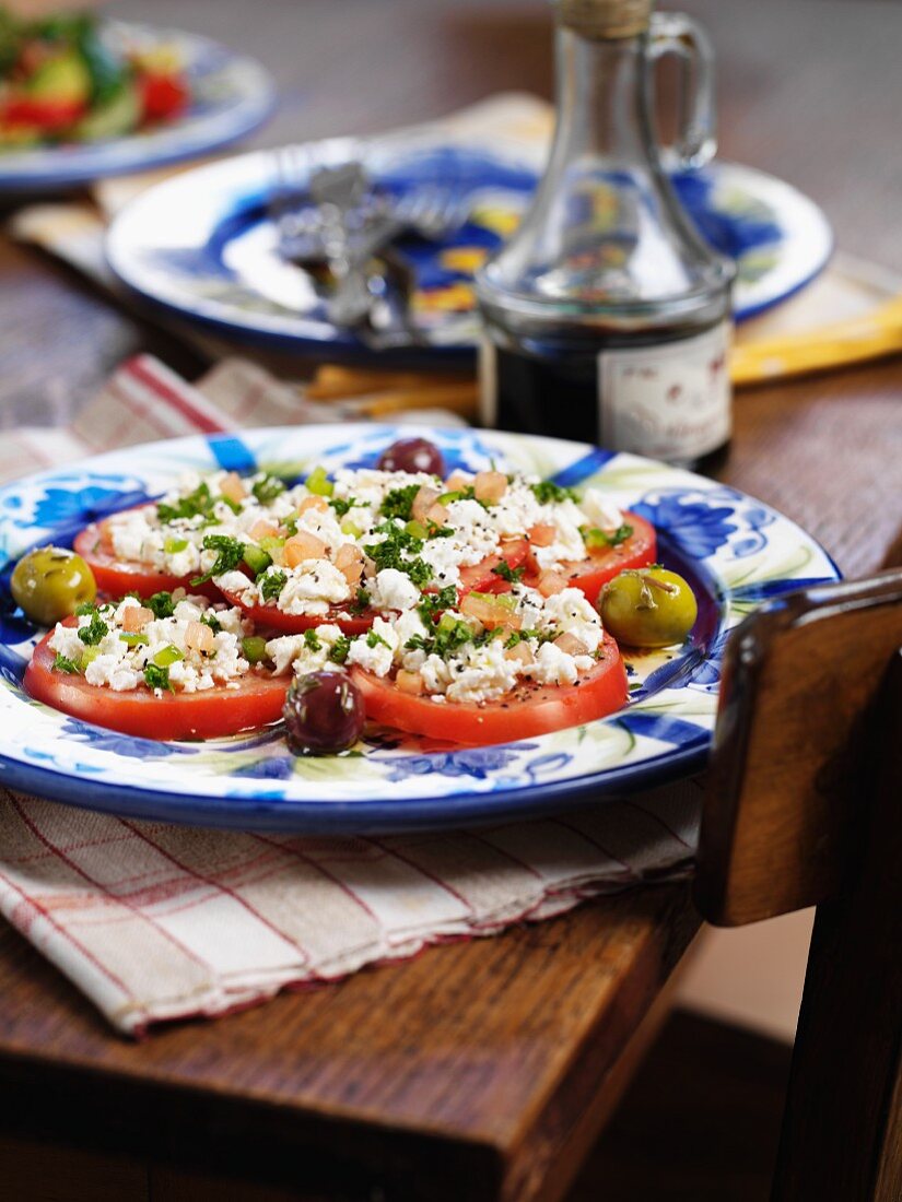 Tomato salad with goats cheese and olives (Spain)