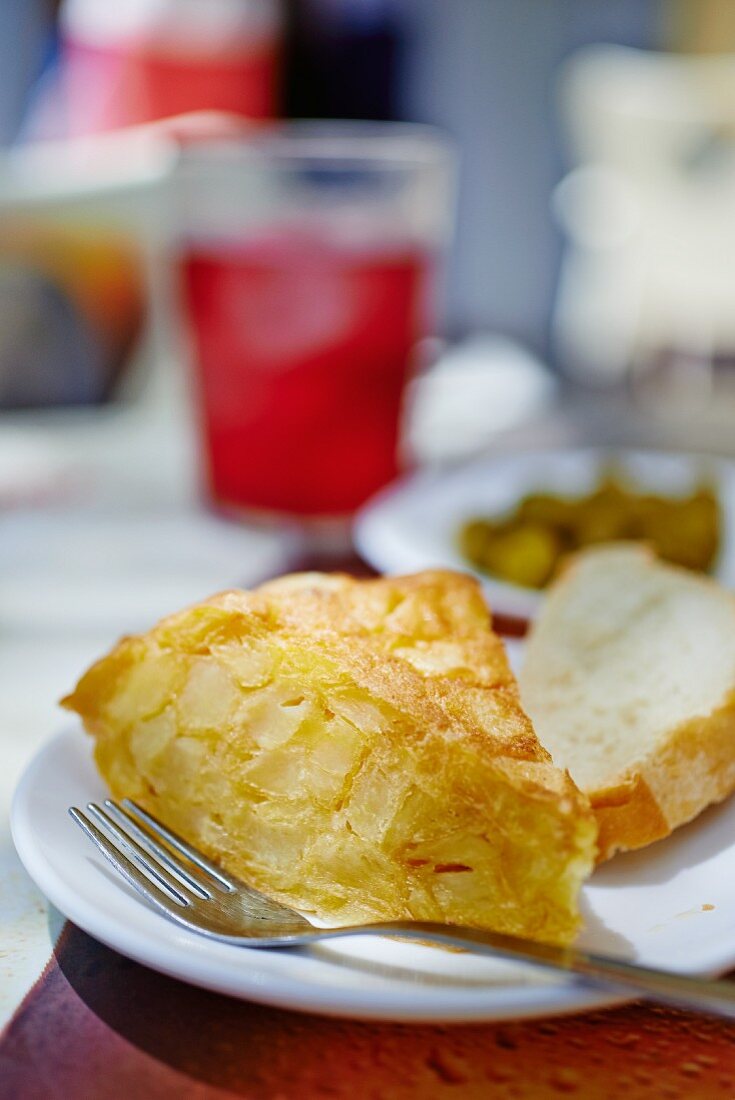 A slice of tortilla with white bread