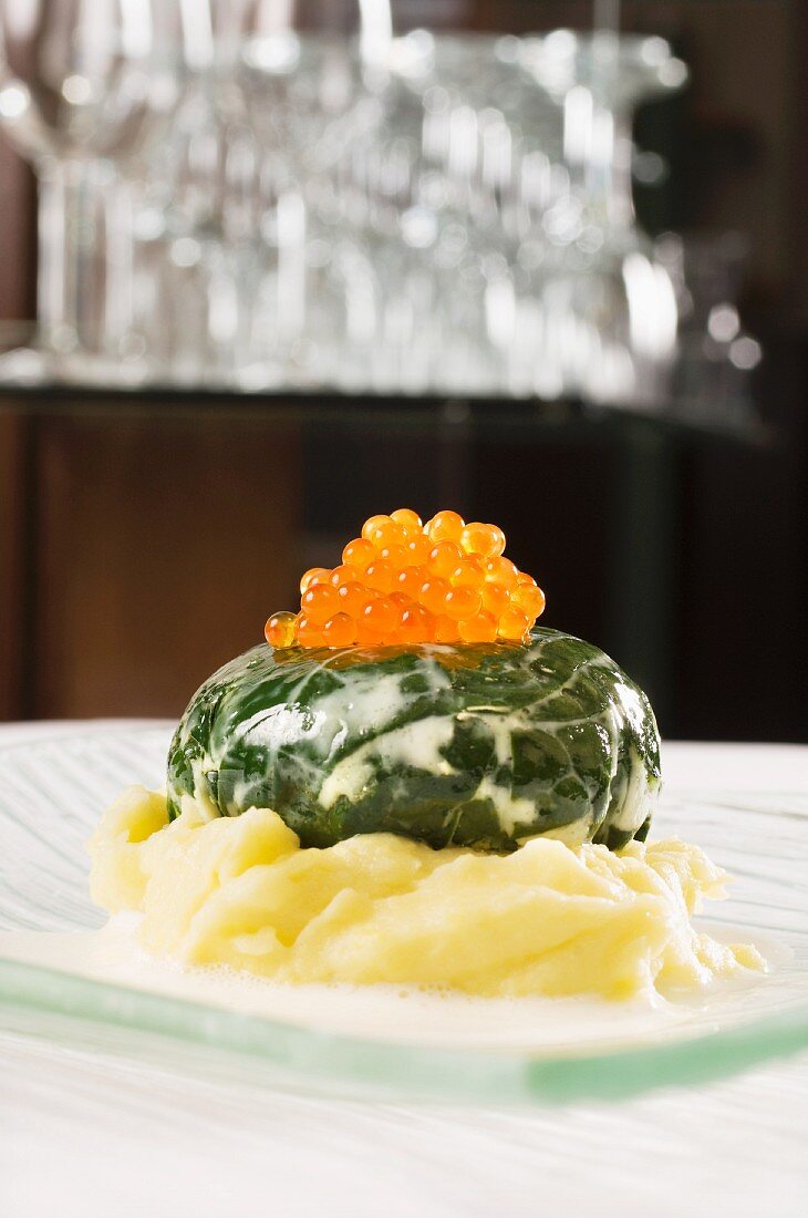 Poached spinach egg with trout caviar
