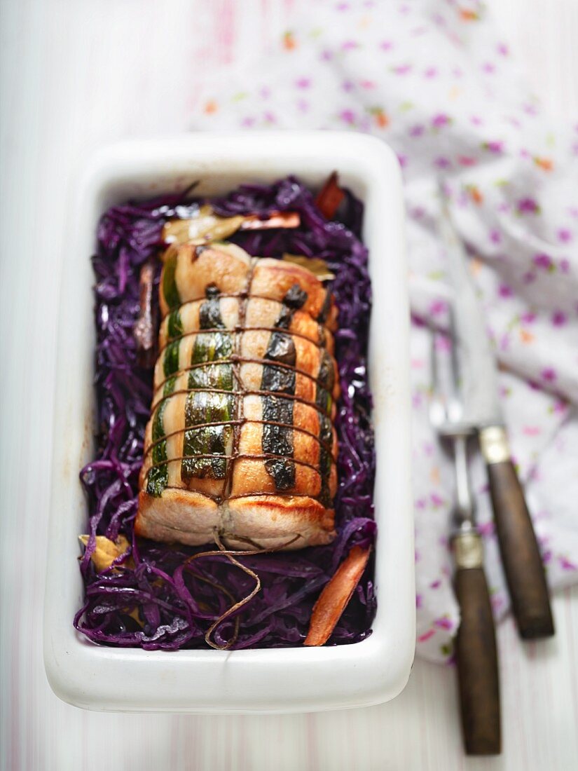 Pork roulade on a bed of red cabbage with cinnamon