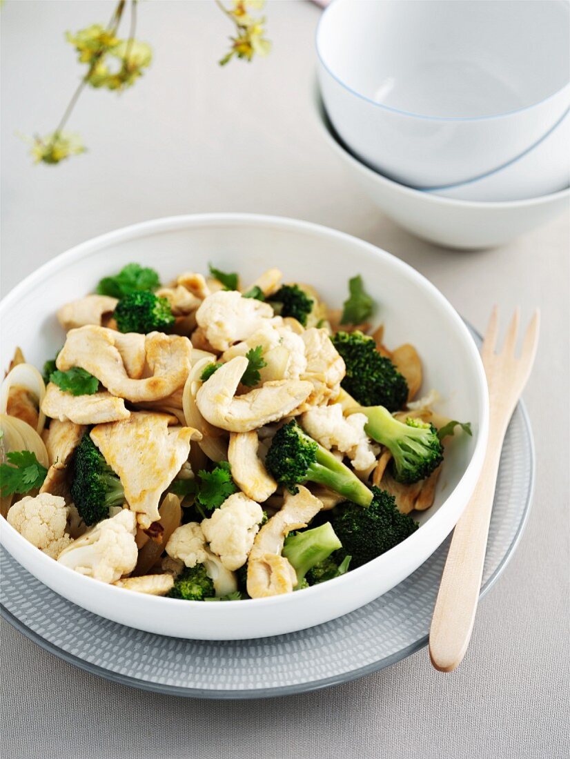 Fried chicken with broccoli and cauliflower