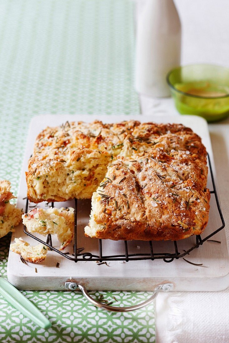A savoury cake made from scone dough with Swiss cheese, bacon and Rosemary