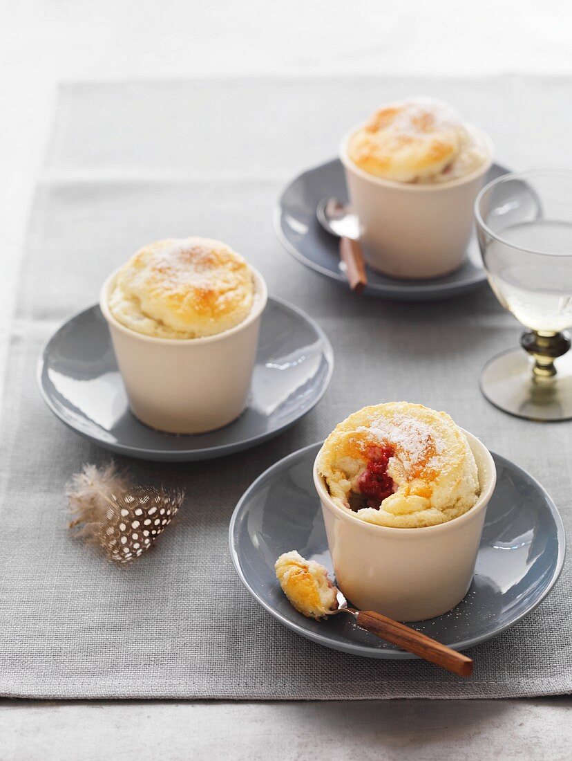Berry soufflés with icing sugar