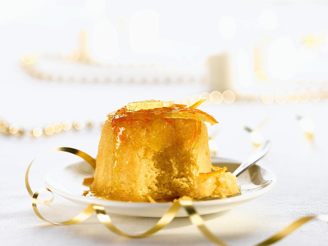 An English pudding with candied orange zest for Christmas dinner