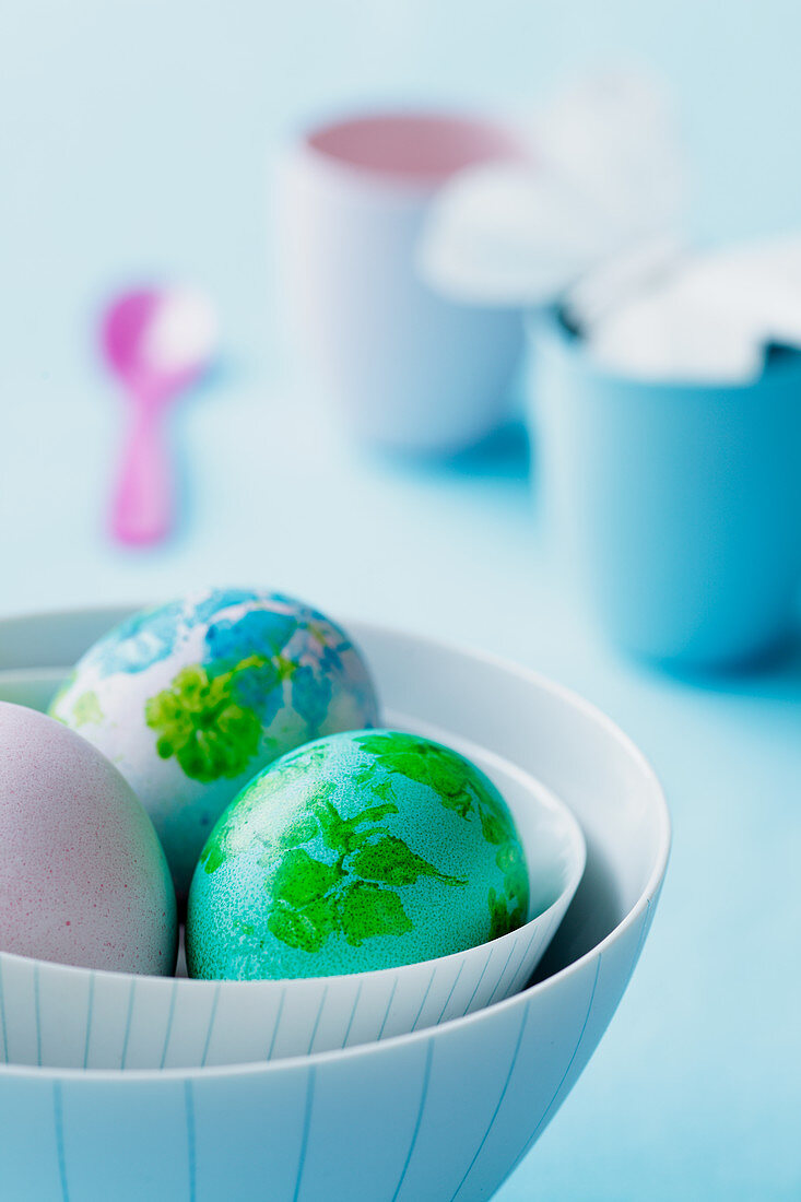 Easter eggs in a stripy bowl