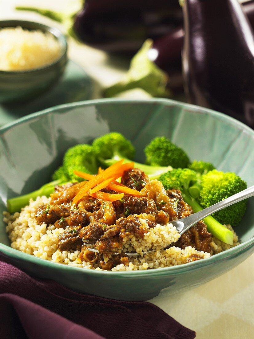 Couscous with beef and aubergine ragout