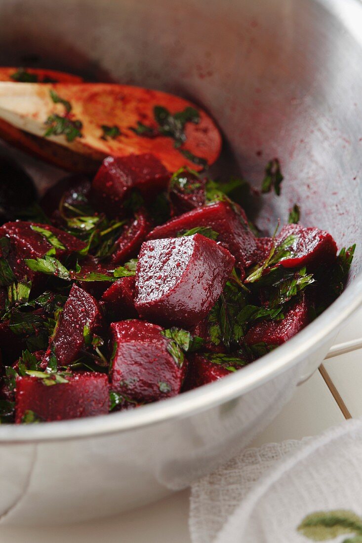Fresh Beet Salad with Parsley and Lemon in a Metal Bowl