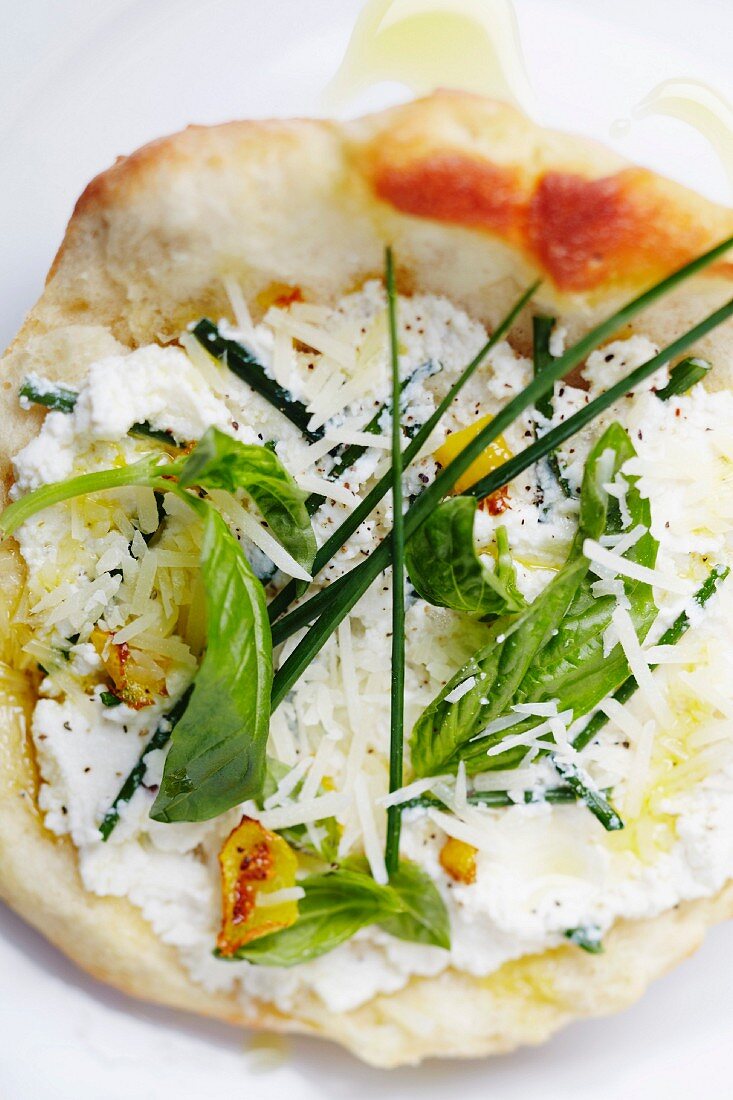 Individual White Pizza with Ricotta Cheese, Chives, Basil and Candied Lemon Peel