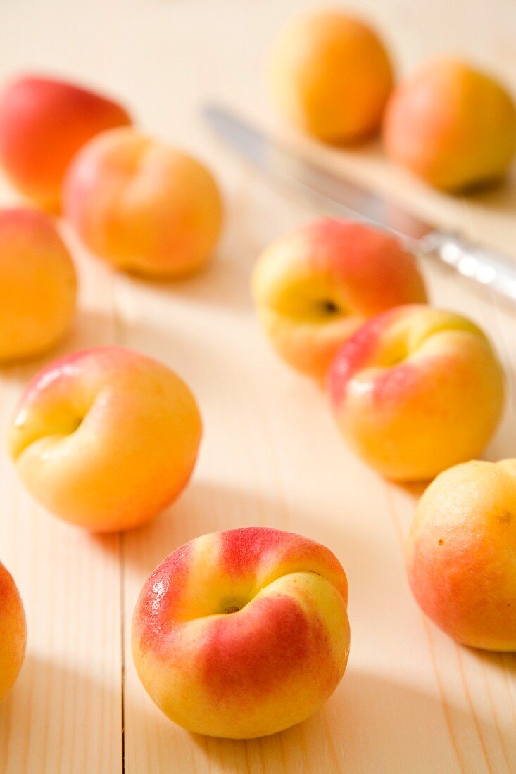 Fresh apricots on a wooden board