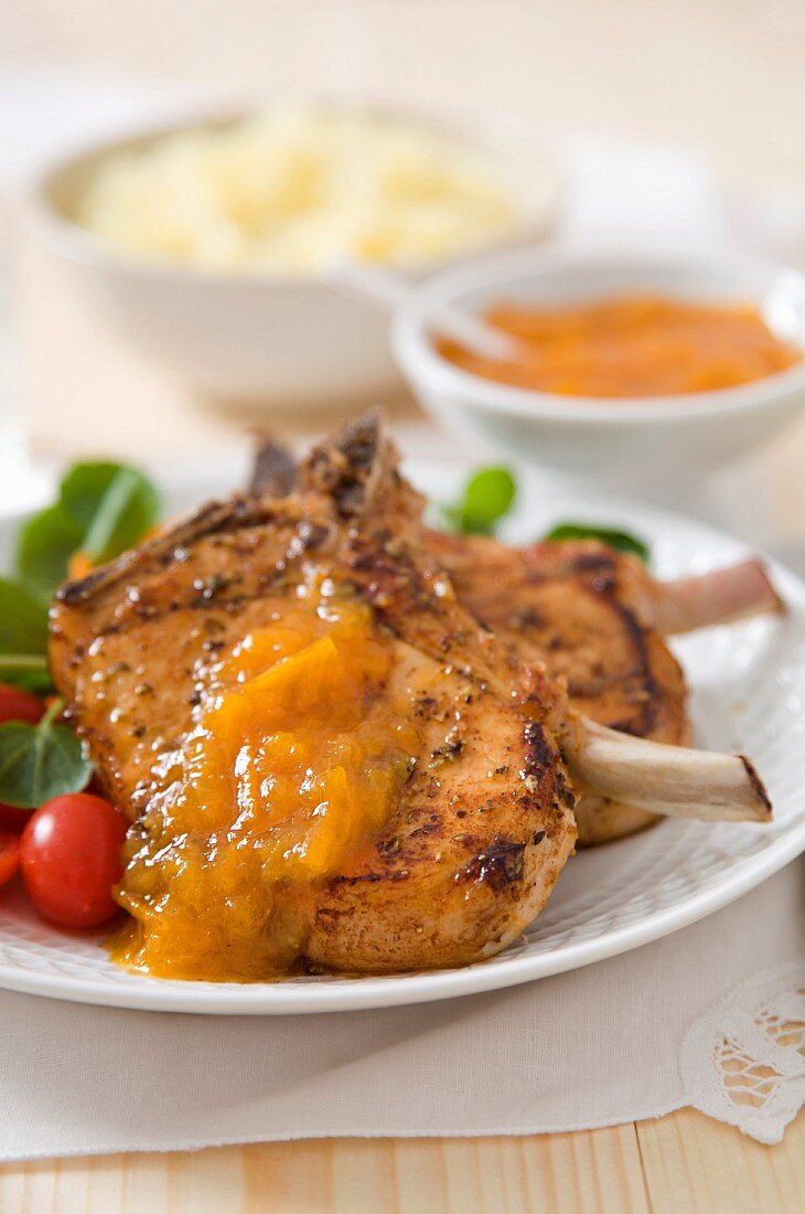 Marinated pork chops with apricot sauce