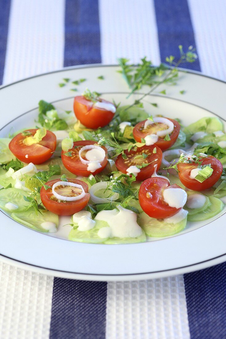 A tomato and cucumber salad with capsella