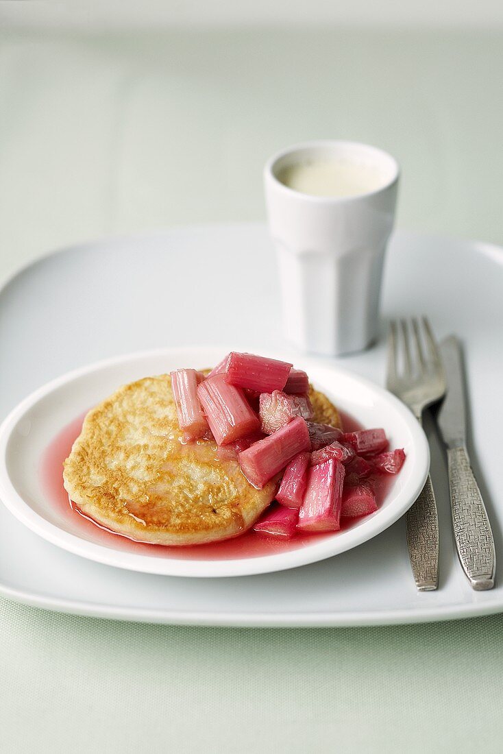A pancake with rhubarb compote