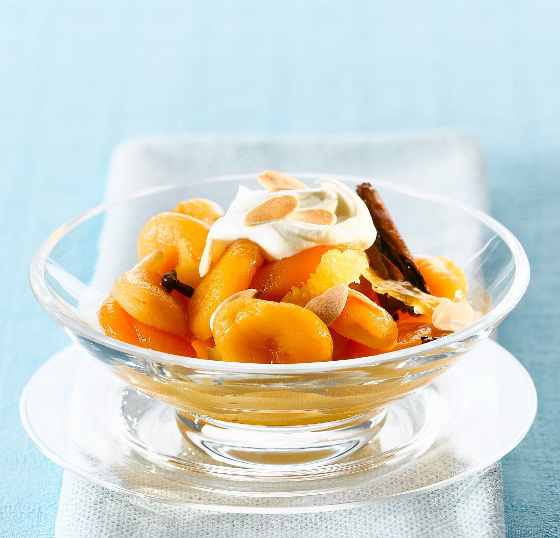 Apricot compote with spices and whipped cream