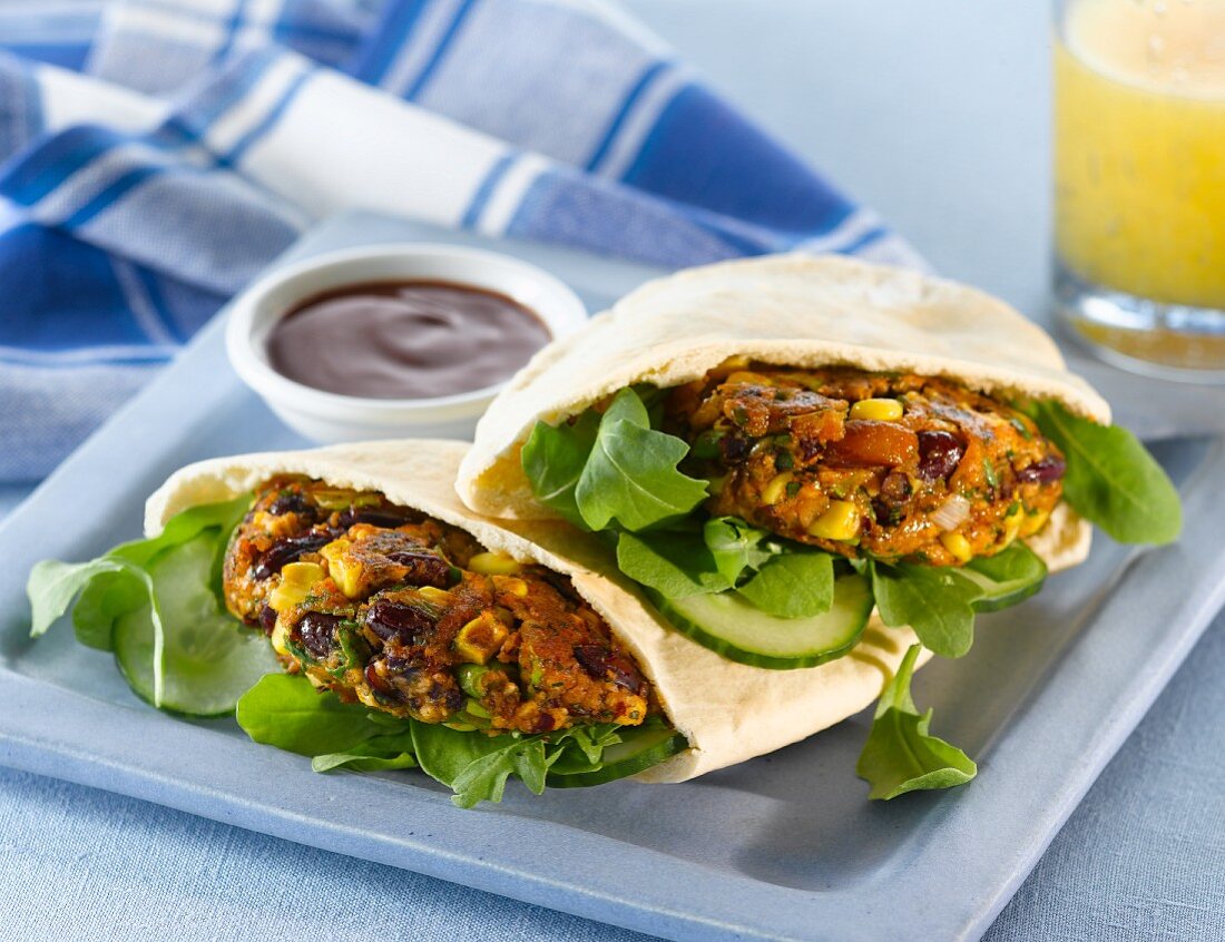 Bean and sweetcorn cakes in pitta bread