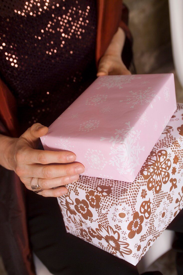 Woman holding Christmas parcel