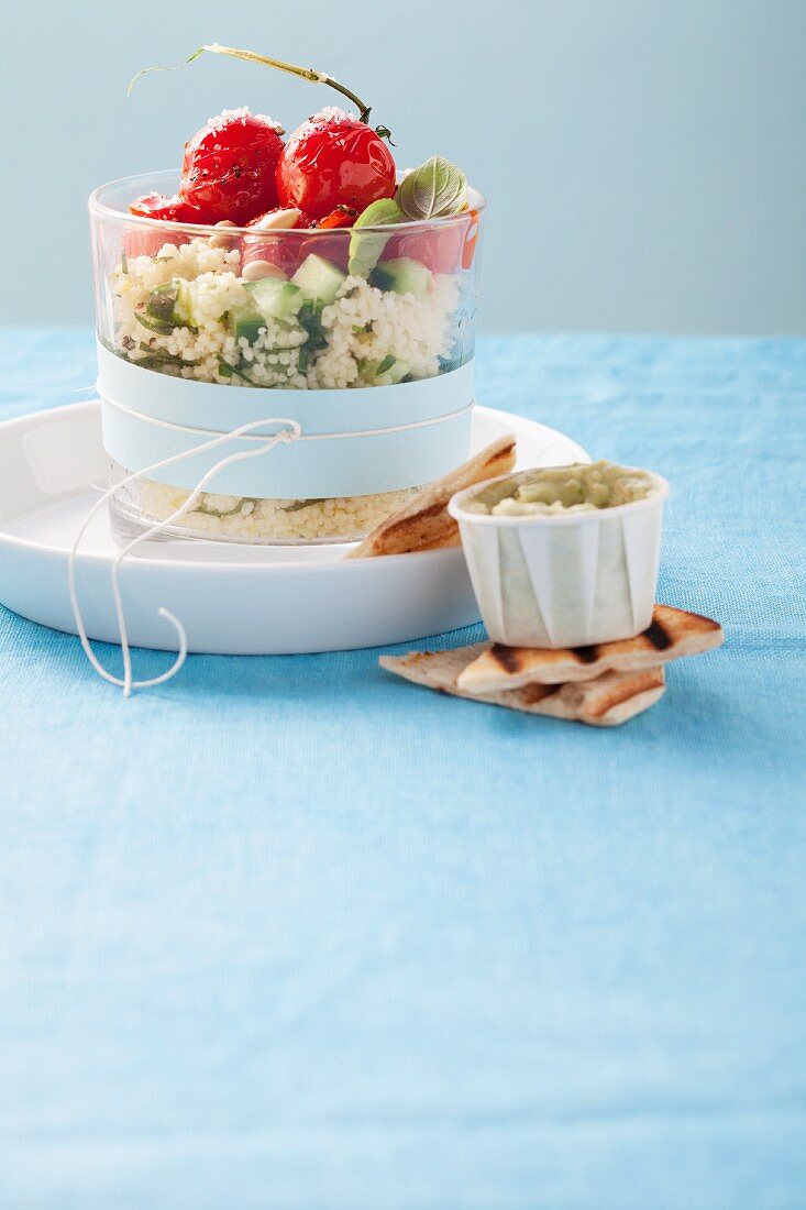 Couscous salad with cucumber and cocktail tomatoes