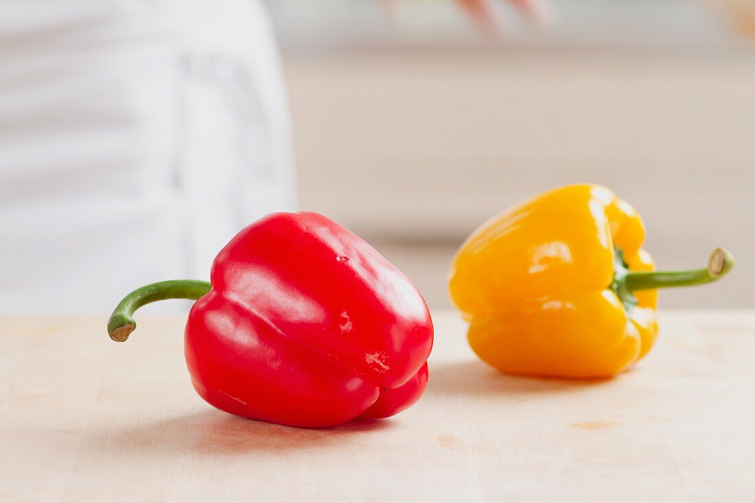 Two peppers, red and yellow