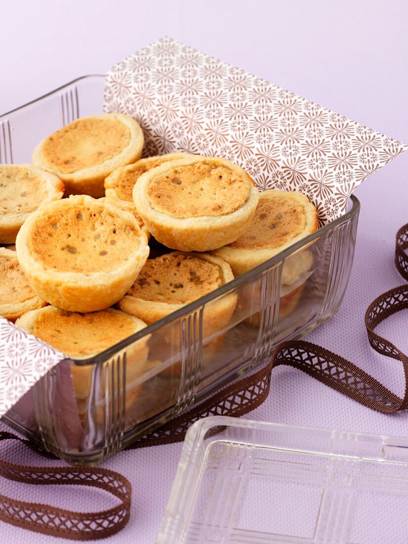 Butter tarts in a glass bowl