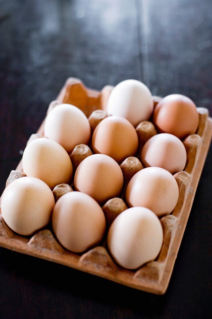 Fresh eggs in an egg box