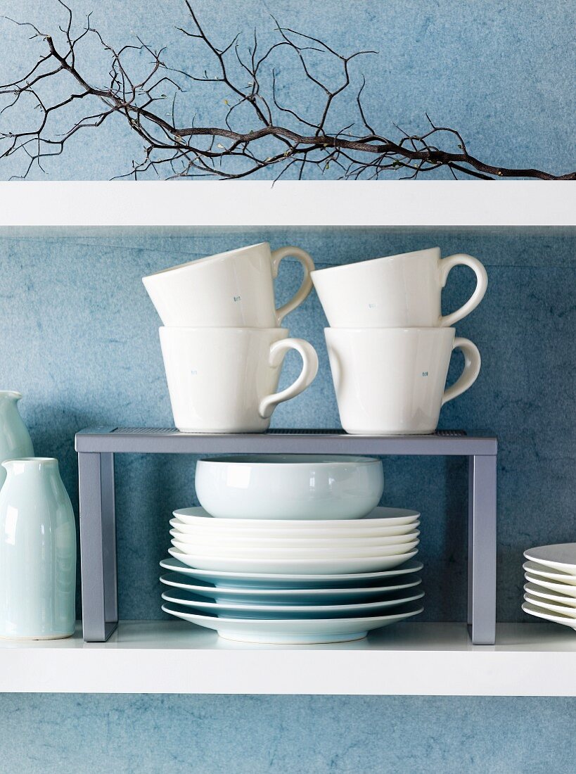 White crockery on a shelf