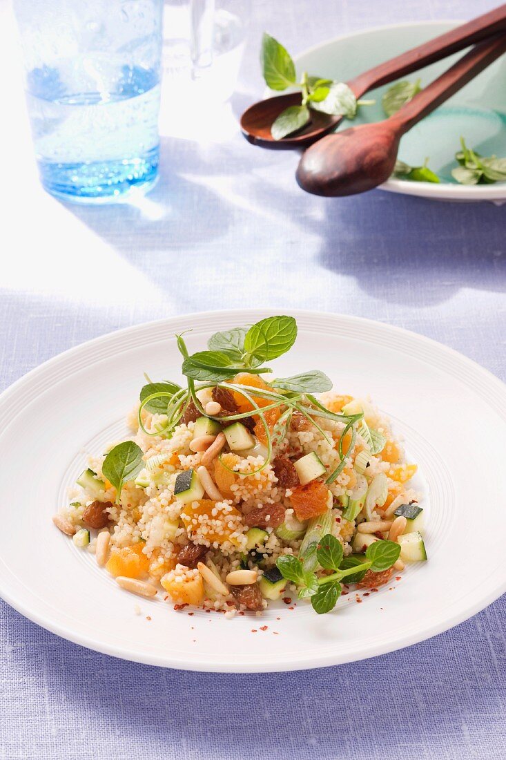 Couscous salad with courgette, dried fruits and pine nuts