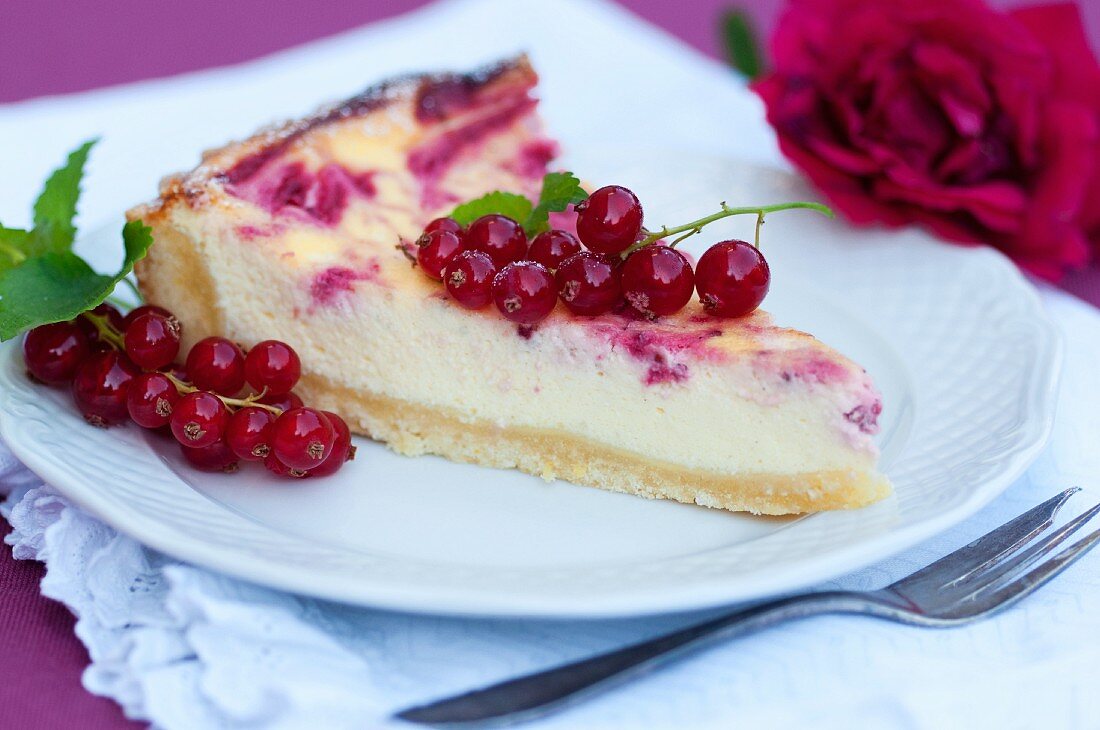 A slice of redcurrant cake on a plate