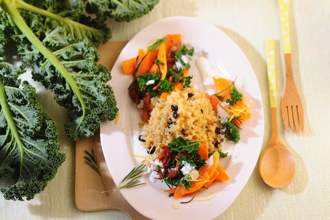 Fried green cabbage and carrots with bulgur wheat and currants