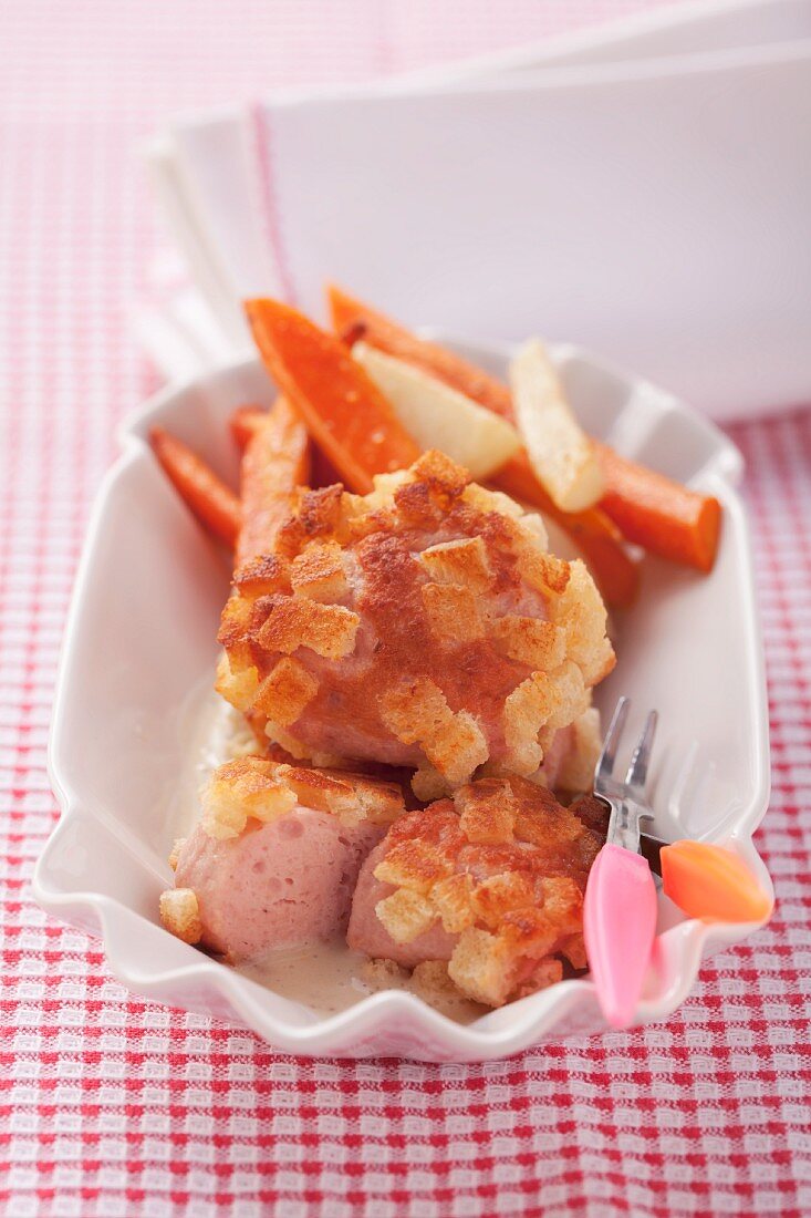 Crispy meatloaf with oven-baked vegetables and mustard sauce