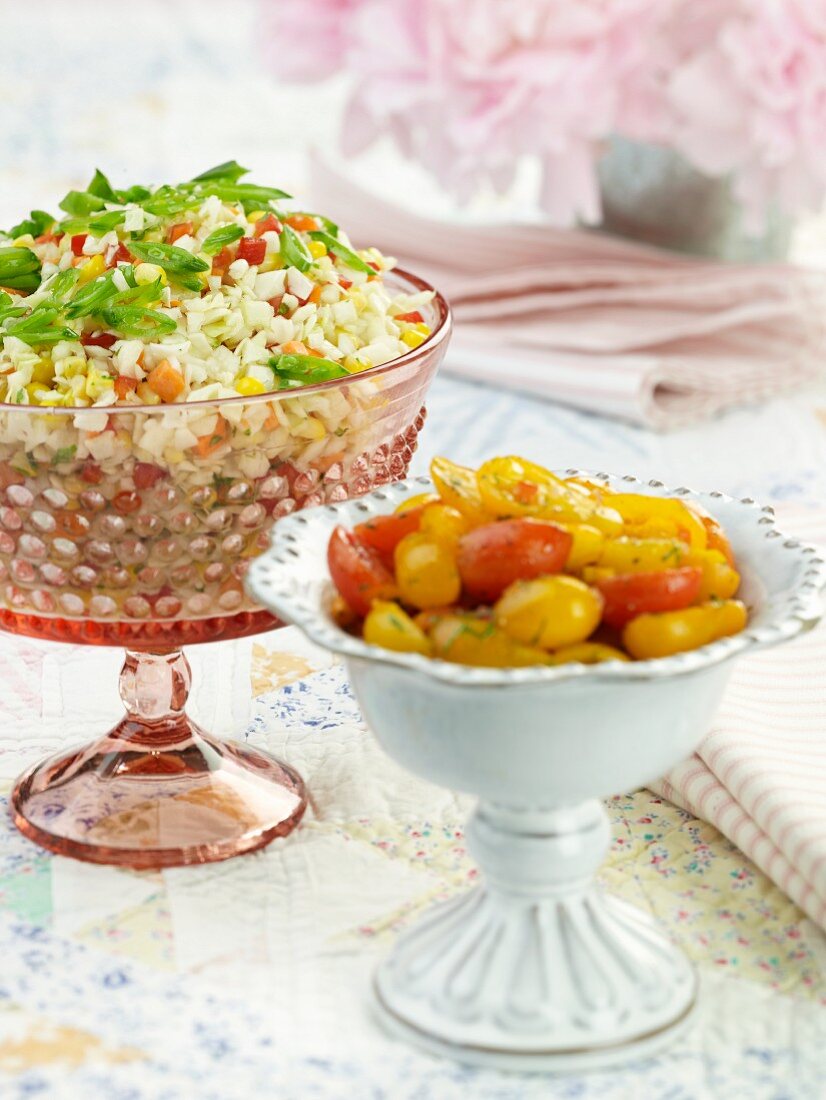 Grape Tomato Salad and Cole Slaw in Serving Dishes
