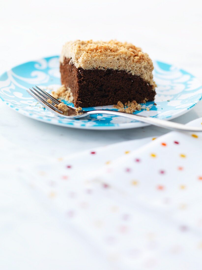 A slice of chocolate crumble cake