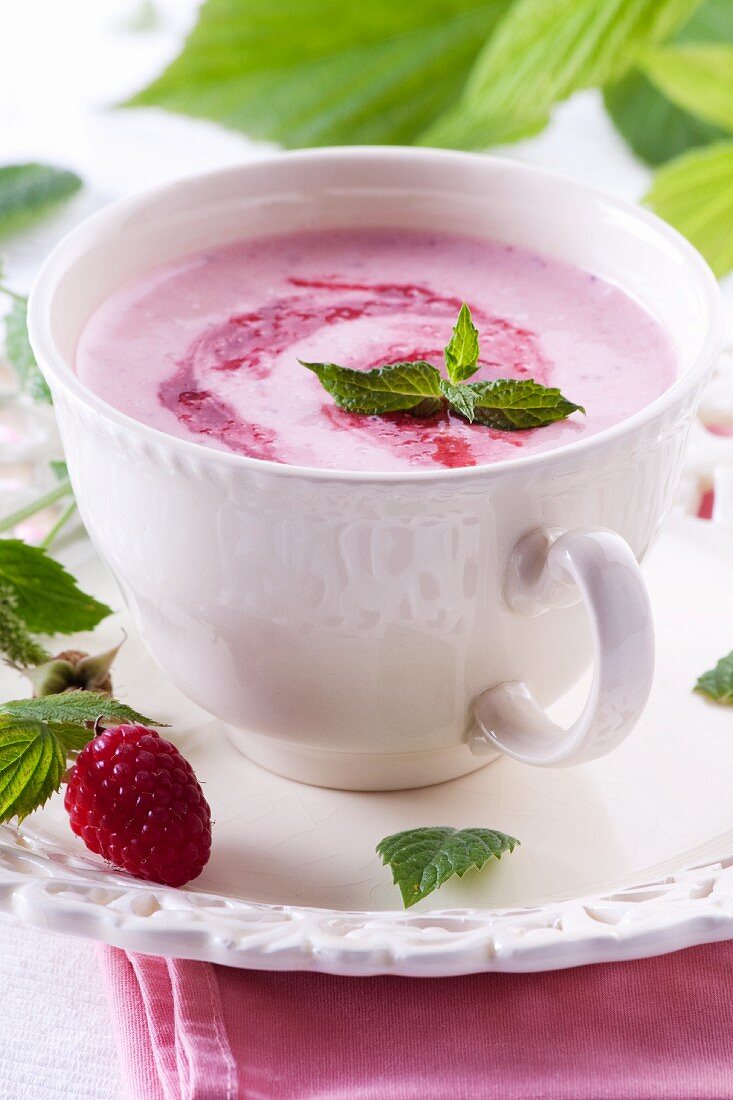 Strawberry soup with mint leaves