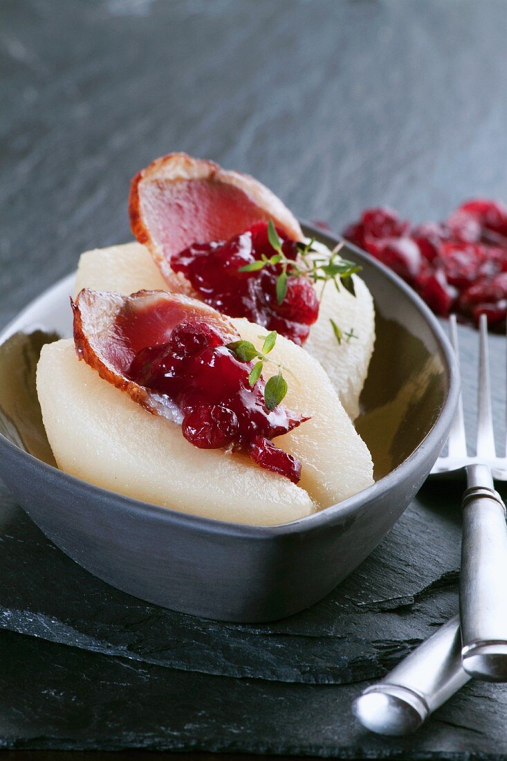 Pears filled with smoked goose breast and dried cranberries