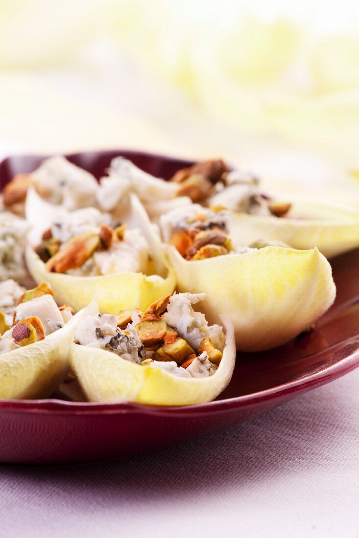 Chicory boats filled with blue cheese and walnuts