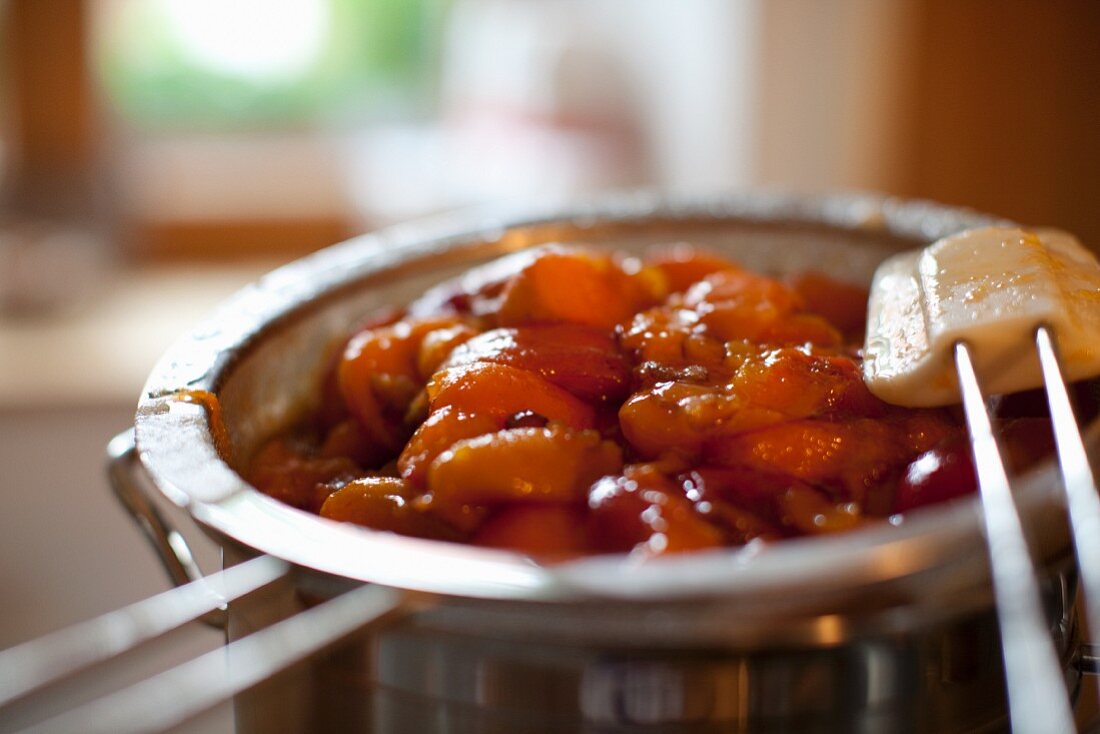 Apricot jam being prepared