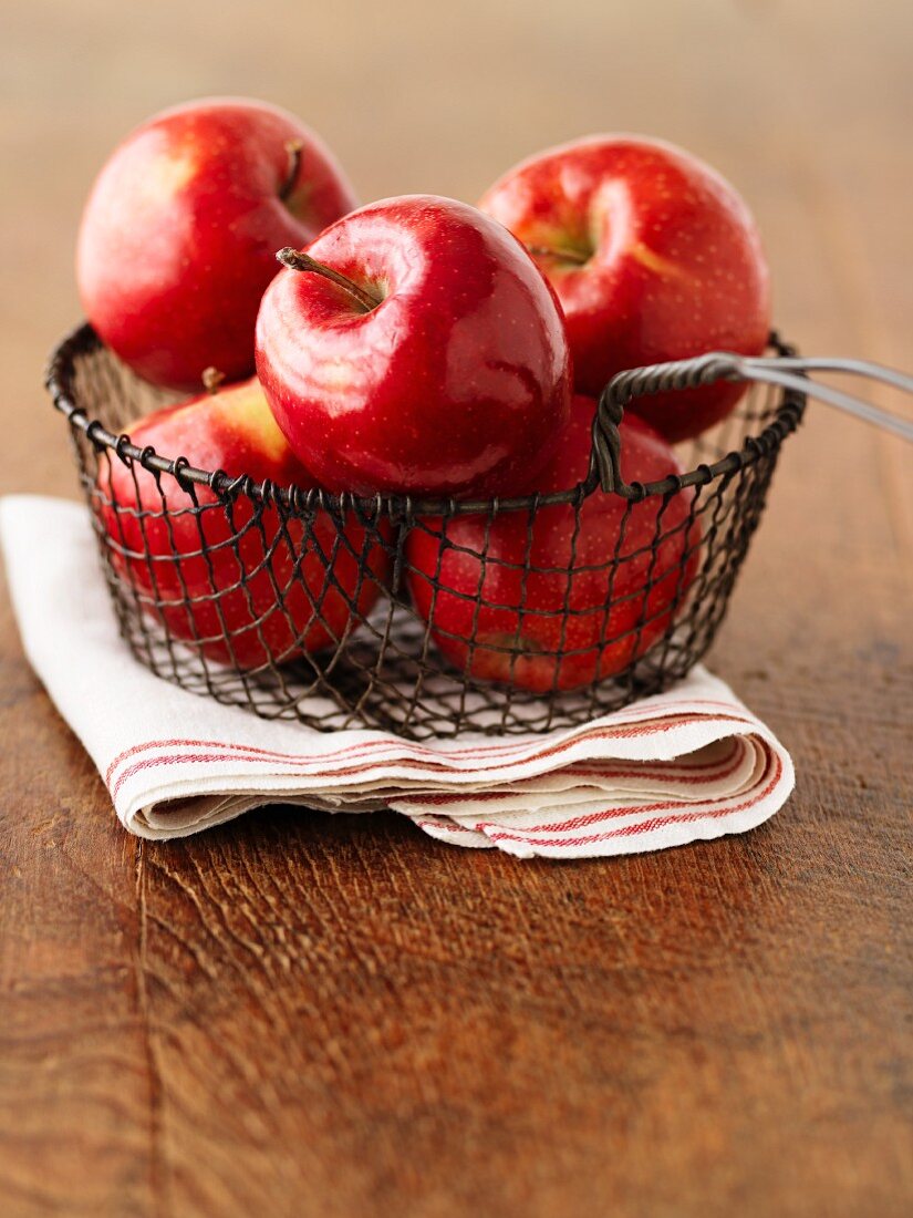 Red Prince apples in a wire basket