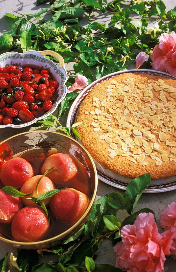 Almond cake, peaches and berries