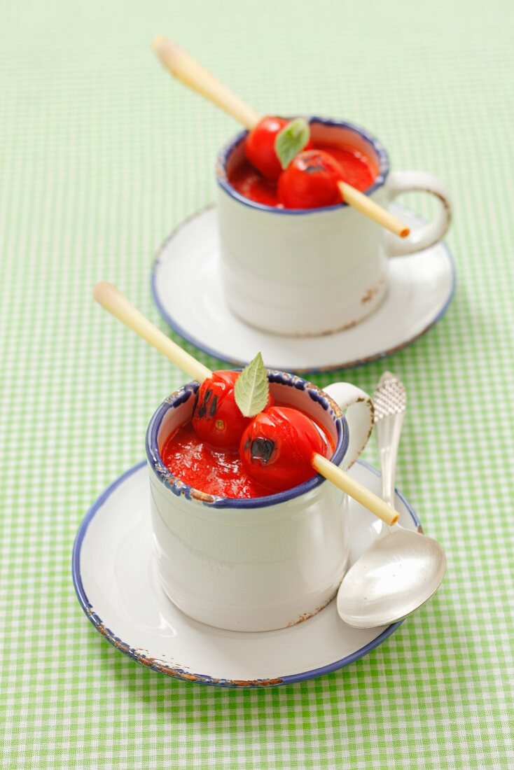 Cream of tomato soup with rice, lemongrass, cherry tomatoes and mint