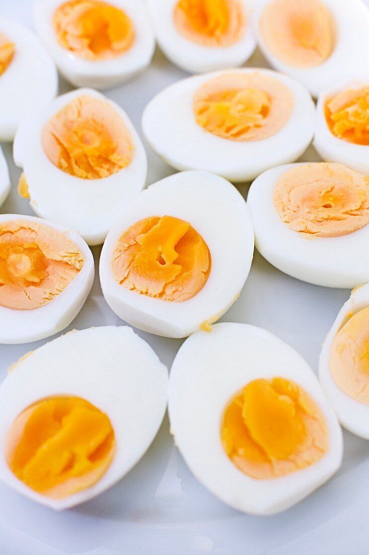 Halved boiled eggs