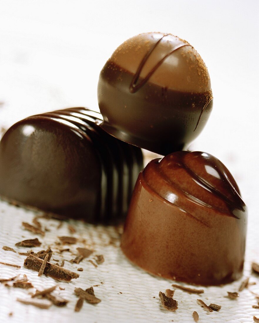 Three chocolate pralines (close-up)