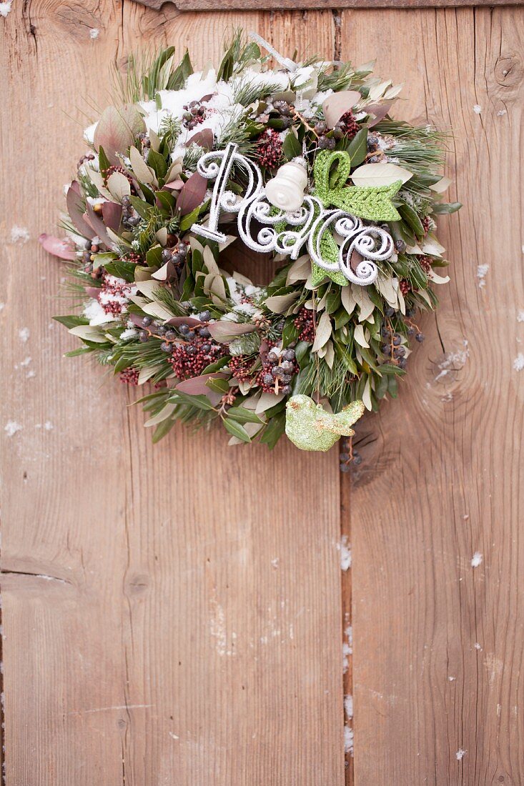 A green and white Christmas wreath