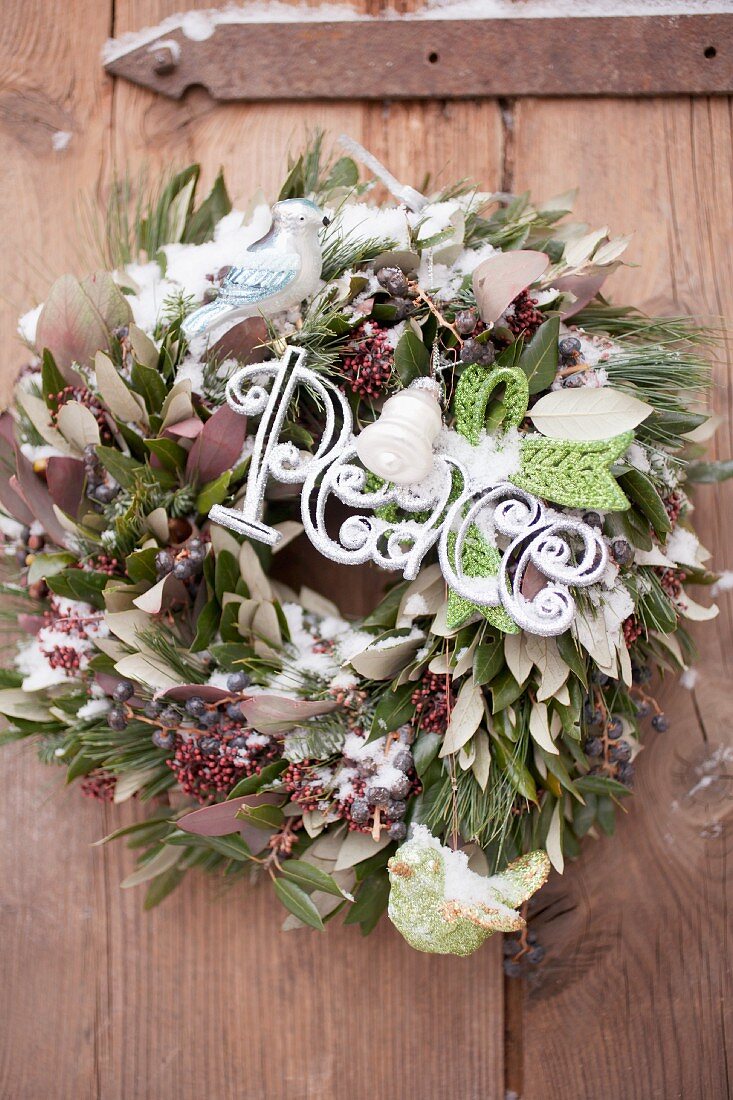 A green and white Christmas wreath