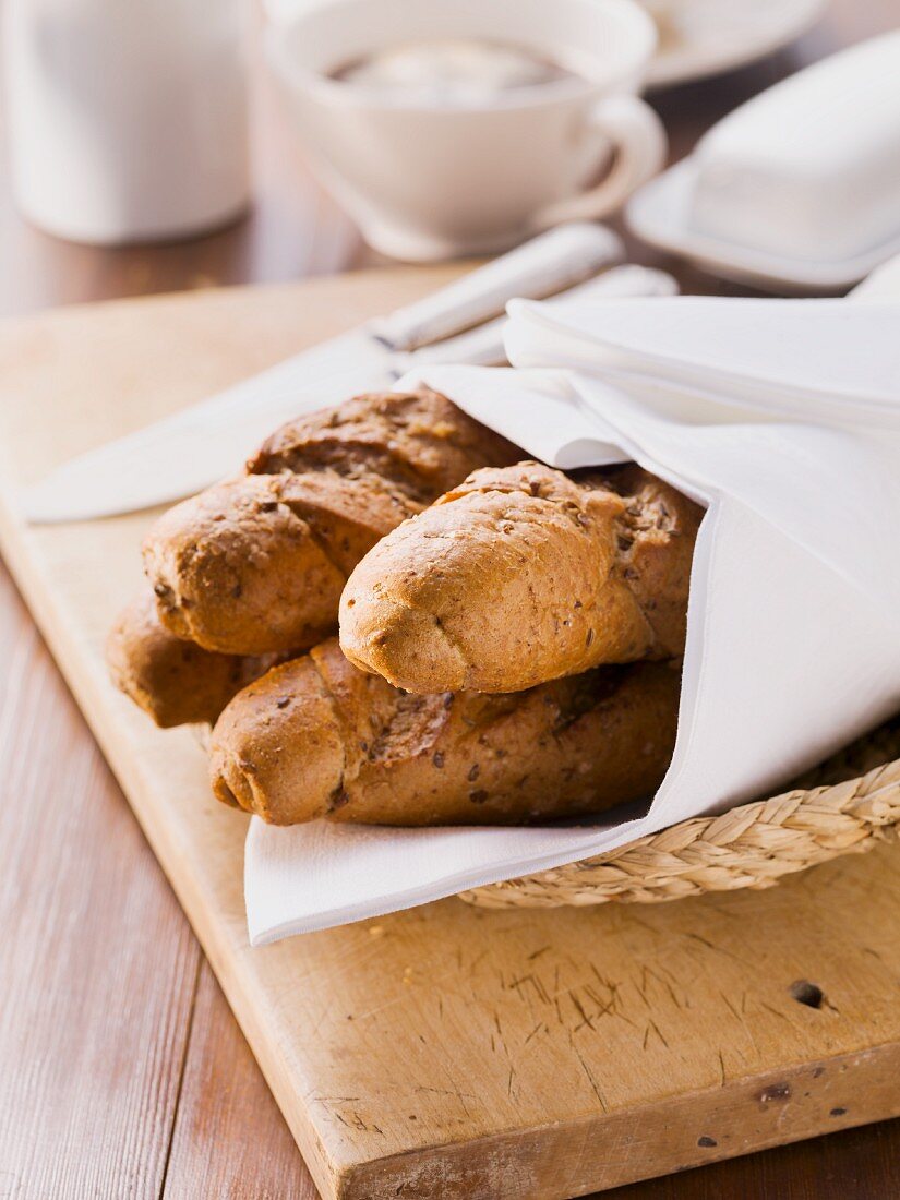 Seeded baguettes in a bread basket