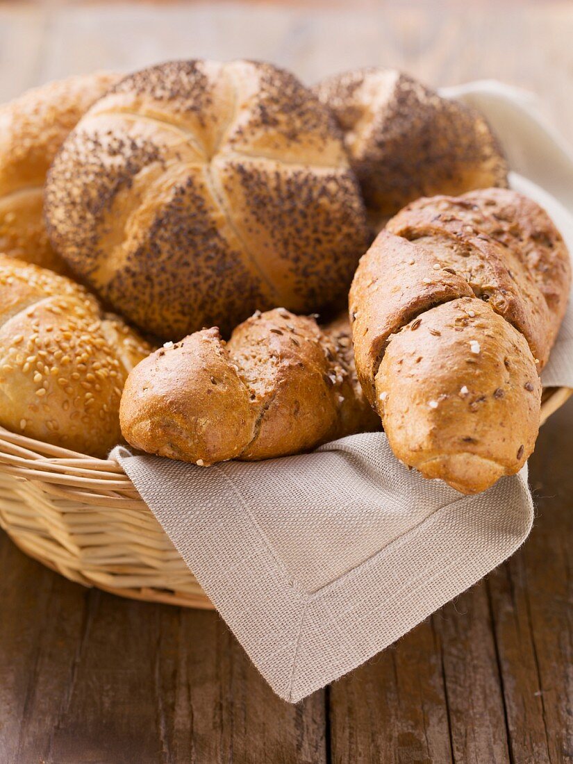 Assorted bread rolls in a bread basket
