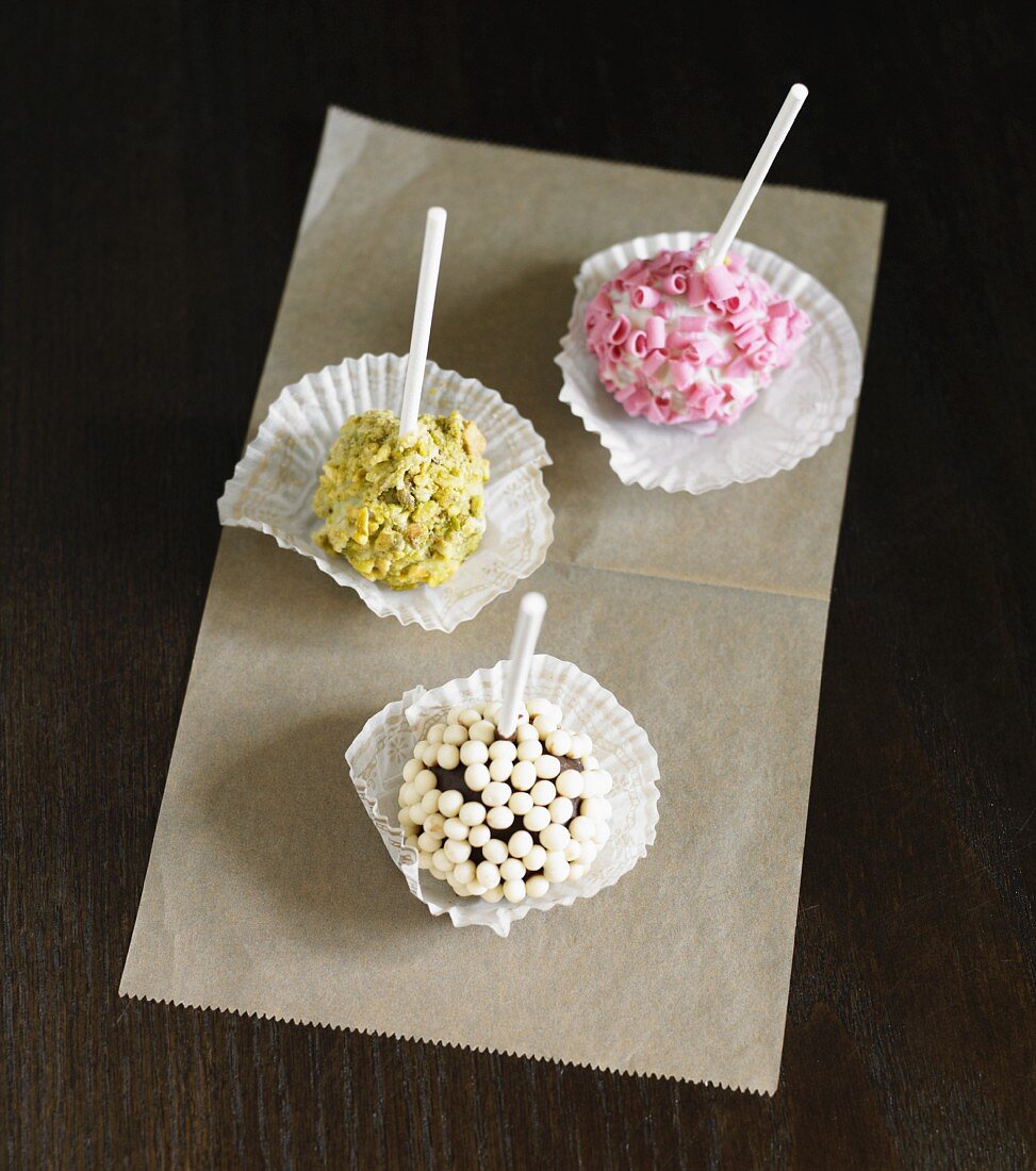 Three Cake Pops; Chocolate, Pistachio and Strawberry; From Above