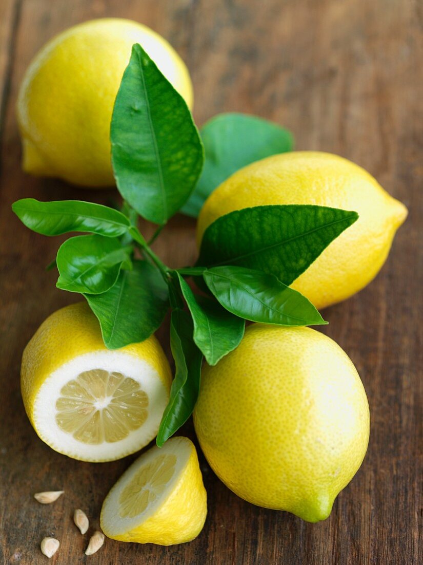 Fresh lemons with leaves