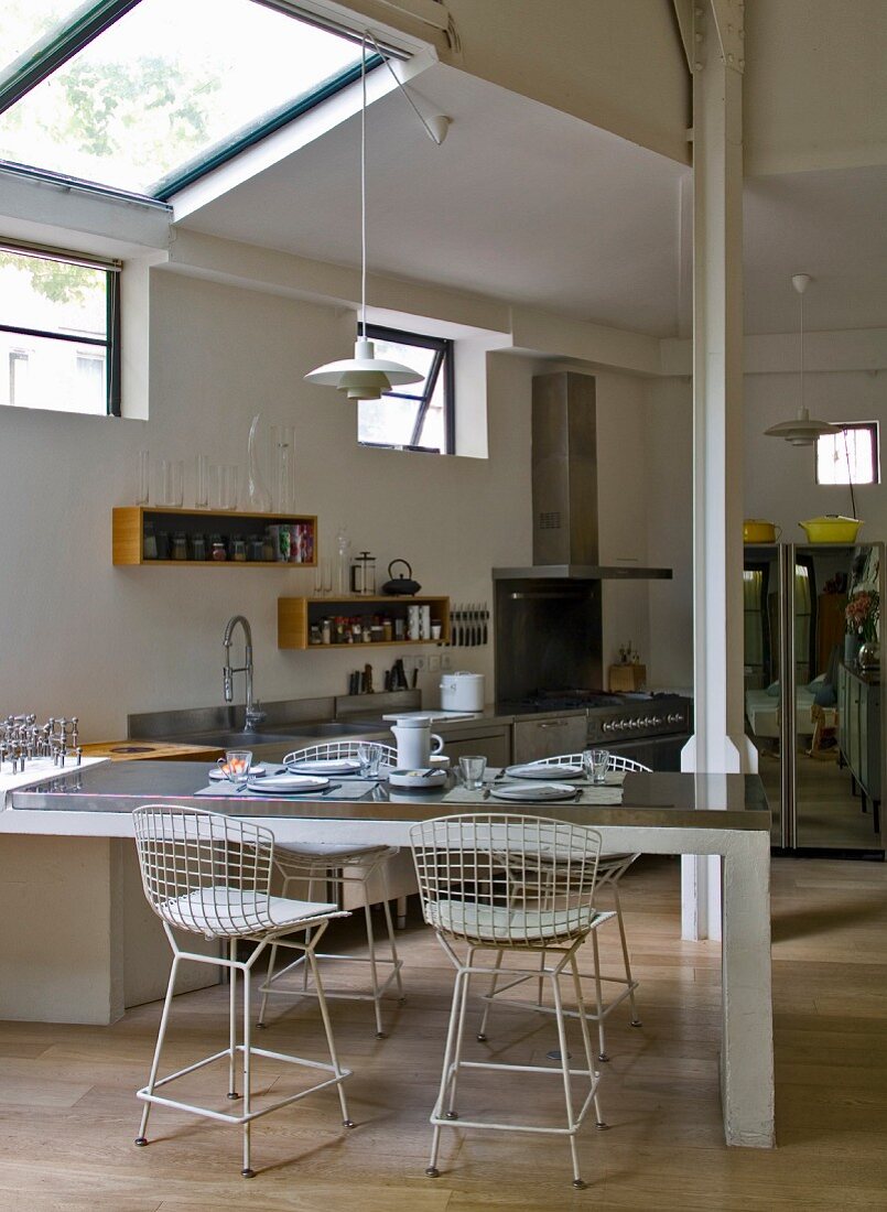 Open-plan living and dining room in loft apartment