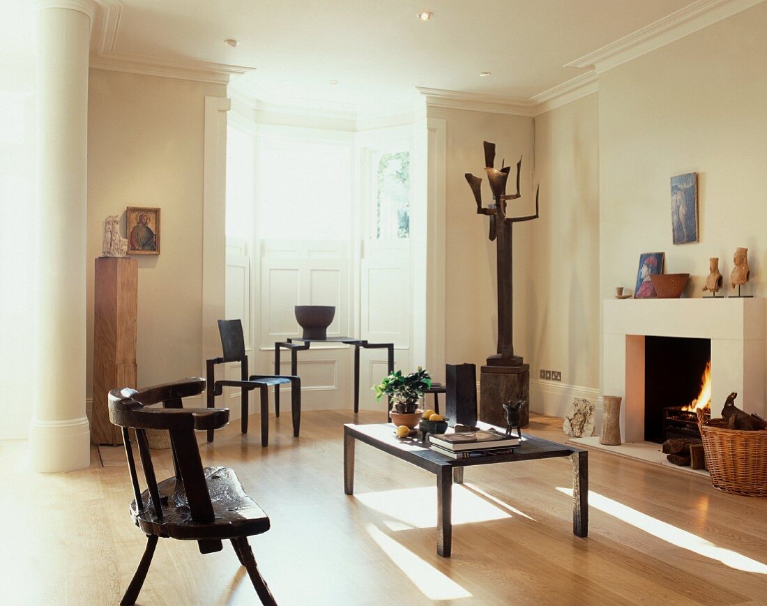 Rustic and modern wooden chairs in modern living room with a classic atmosphere